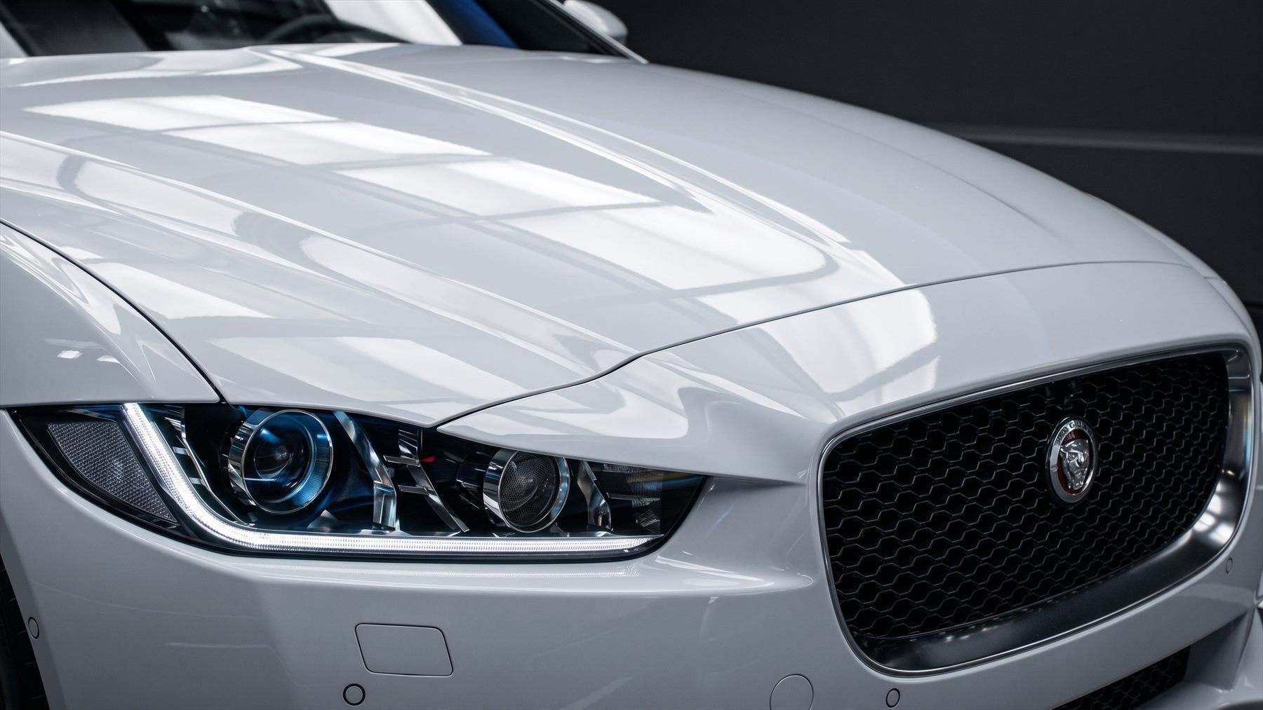 Grille and headlamp